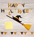 Broom with hat of a witch with flags and Letters and an inscription of a happy Halloween hang on clothespins on a rope. Vector on