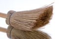 Broom over mirror Royalty Free Stock Photo