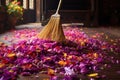 broom sweeping a floor with a trail of flower petals