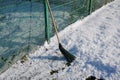 Broom for sweeping snow. Sweep snow with a broomstick.