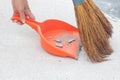 A broom sweeps debris on the floor Royalty Free Stock Photo