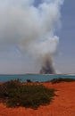 BROOME, WESTERN AUSTRALIA/AUSTRALIA - SEPTEMBER 26th 2019 : landscape view of smoke column rising from bush fire north of cable