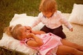 Brother boy play with girl sister outdoor Royalty Free Stock Photo