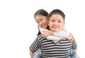 Brother giving piggyback ride to sister isolated on white