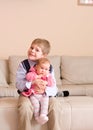 Brother holding little sister Royalty Free Stock Photo