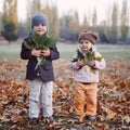 Brother and sister in the autumn park