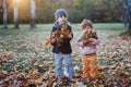 Brother and sister in the autumn park