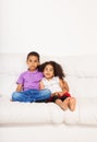 Brother and sister on the couch Royalty Free Stock Photo