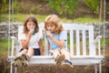 Brother and sister drink green smoothie outside. Little boy and girl working in the garden. Two happy children in summer Royalty Free Stock Photo