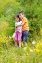 Brother and sister are embracing in a beautiful summer day Royalty Free Stock Photo