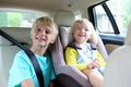 Brother and sister enjoying trip in the car Royalty Free Stock Photo