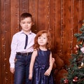 Brother and sister. New Year xmas child. Christmas eve holiday. interior. Small children. Family portrait Royalty Free Stock Photo