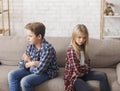 Brother And Sister Not Talking After Quarrel Sitting On Couch Royalty Free Stock Photo