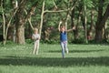 Brother and sister play meadow in summer day Royalty Free Stock Photo