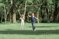 Brother and sister play meadow in summer day Royalty Free Stock Photo