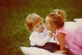 Brother and sister play on summer day outdoor Royalty Free Stock Photo