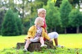 Brother and sister playing in autumn park Royalty Free Stock Photo