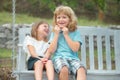 Brother and sister playing outside. Little boy and girl working in the garden. Two happy smiling laughing children Royalty Free Stock Photo