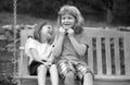 Brother and sister playing outside. Little boy and girl working in the garden. Two happy smiling laughing children Royalty Free Stock Photo