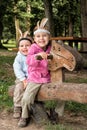 Brother and sister playing on the swing Royalty Free Stock Photo