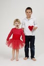 Brother and sister portrait with red heart Royalty Free Stock Photo