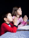 Brother and sister say prayers. Royalty Free Stock Photo