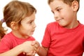 Brother and sister with smile shake hands Royalty Free Stock Photo