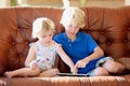 Brother and sister using tablet pc at home Royalty Free Stock Photo