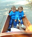 Brothers on a cart visiting the zoo