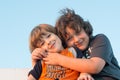 Brothers hugging at sunset Royalty Free Stock Photo