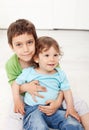 Brothers love - young boys sitting Royalty Free Stock Photo