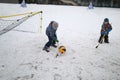 Brothers play bandy Royalty Free Stock Photo