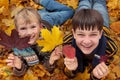 Brothers playing in Autumn