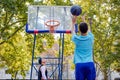 Brothers playing basketball One On One. Royalty Free Stock Photo