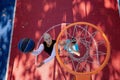 Brothers playing basketball One On One. Royalty Free Stock Photo