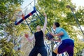 Brothers playing basketball One On One. Royalty Free Stock Photo