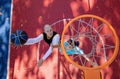 Brothers playing basketball One On One. Royalty Free Stock Photo