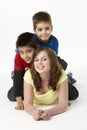 Brothers And Sister In Studio Royalty Free Stock Photo