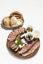 Brotzeit cold cuts meat sharing platter on white background Royalty Free Stock Photo