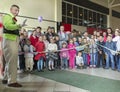Brovary.Ukraine. 25.04.2015. The crowd of children is watching at the illusionist showing the focus