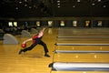 Brovary, Ukraine, 30.01.2011 A man in throwing the bowling ball in the bowling club