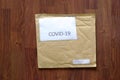 Brown air bubble envelope with COVID-19