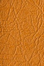 Brown artificial or synthetic leather background with neat texture and copy space Royalty Free Stock Photo
