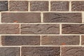 Brown background of unusual building brick Royalty Free Stock Photo