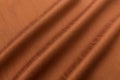 Brown background luxury cloth or wavy folds of grunge silk texture satin velvet Royalty Free Stock Photo