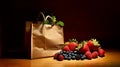 A brown bag brims with a cornucopia of ripe, colorful fruits, tantalizing display of nature\'s crops