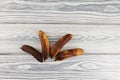 Brown bananas on textured wooden background. Fermented fruit is suitable for baking banana bread