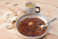 Brown bean stew on a country metal plate