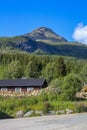 Brown beautiful cabin hut with mountain panorama, Hemsedal, Norway