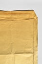 Brown and beige cardboard paper mail envelope on a white background Royalty Free Stock Photo
